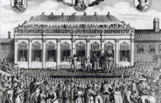 An image shows the execution of Charles the first. Crowds of people surround the stage where he is being executed.